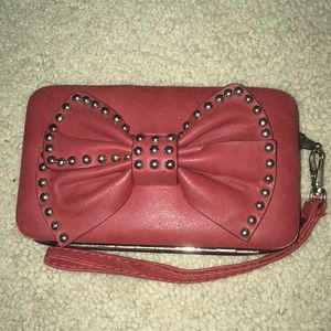 Maroon wristlet with bow detail